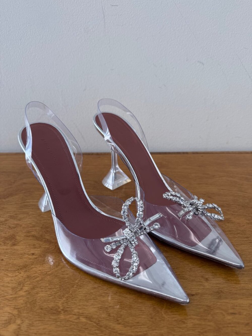 Amina Muaddi Rosie Glass Sling Pumps in transparent PVC with crystal bow embelli